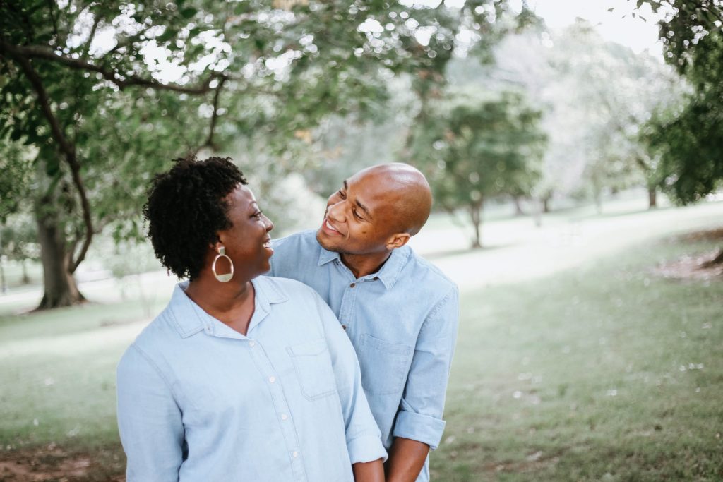 a man and woman kissing