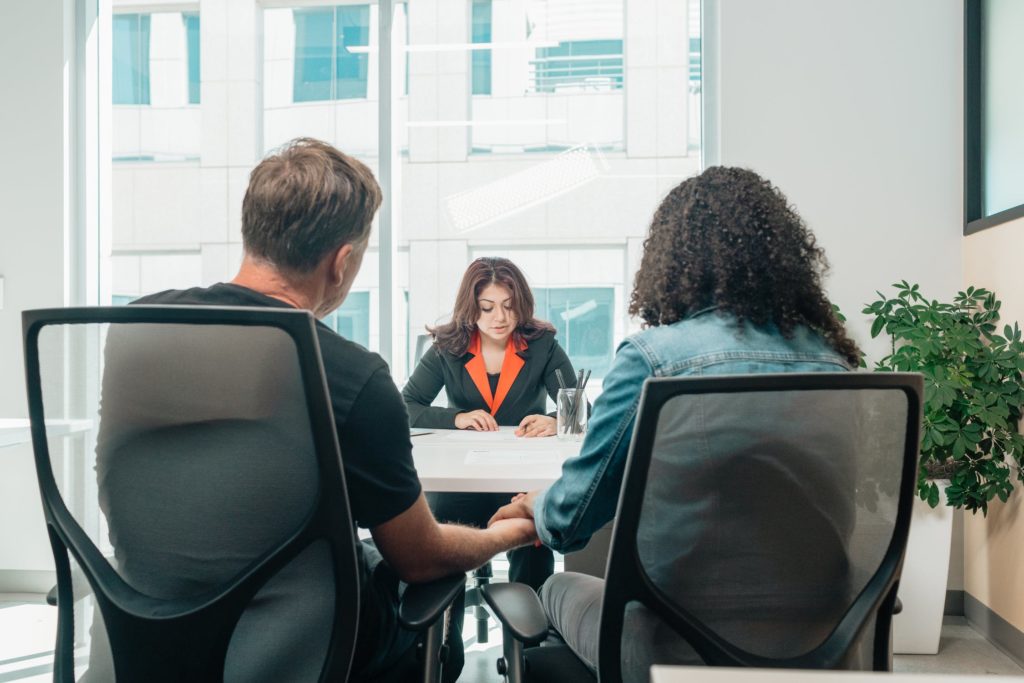 a group of people sitting at a table