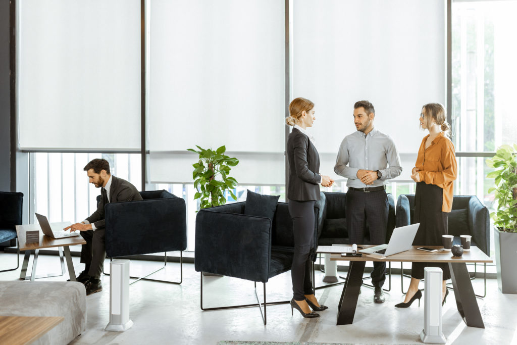 a group of people in an office